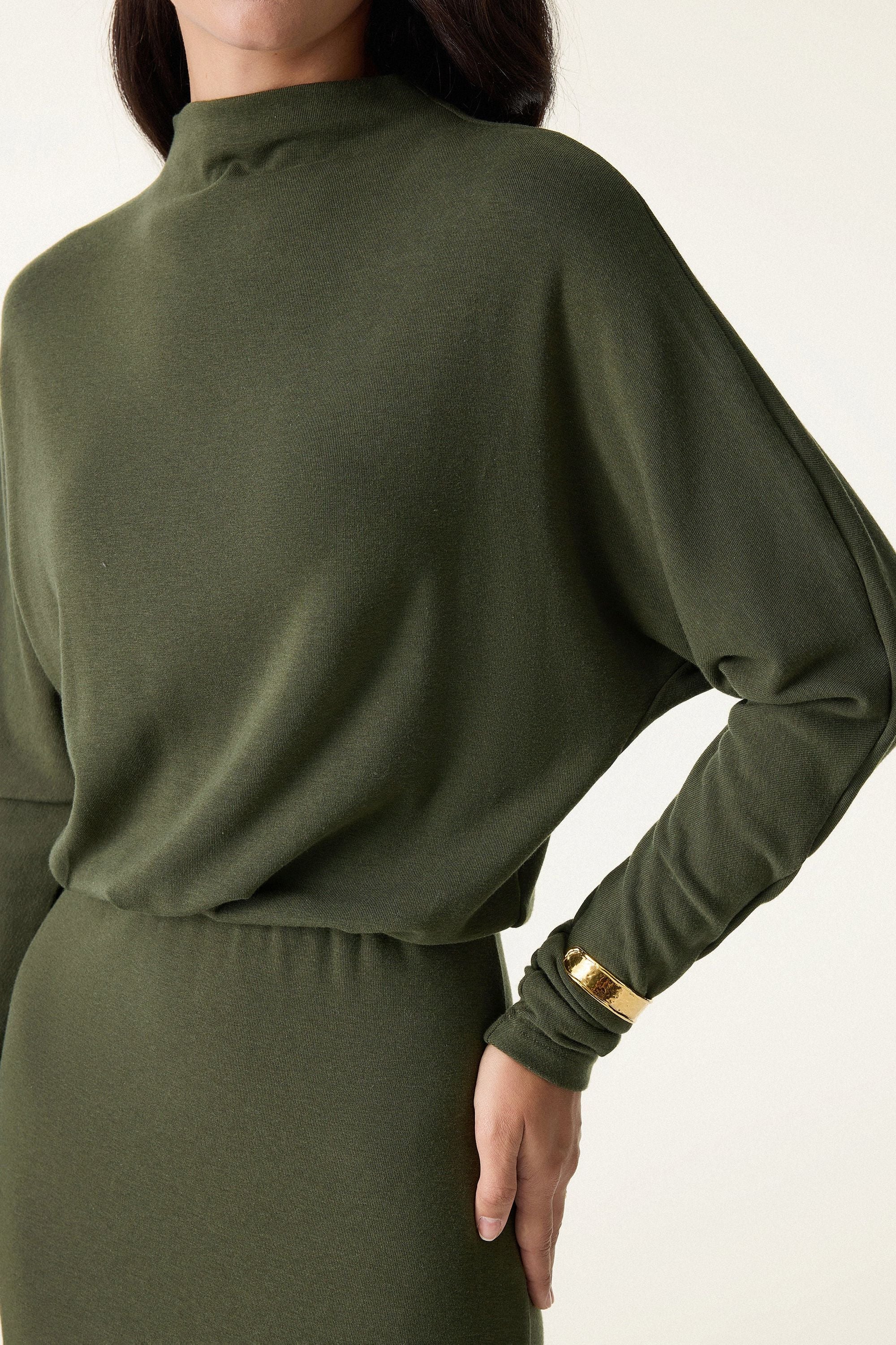 Abito con maniche a vita arricciata